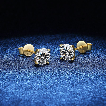 Aretes femeninos dorados Tera™ de Rose & Oliver, elegantes y delicados, detalles visibles en la imagen.