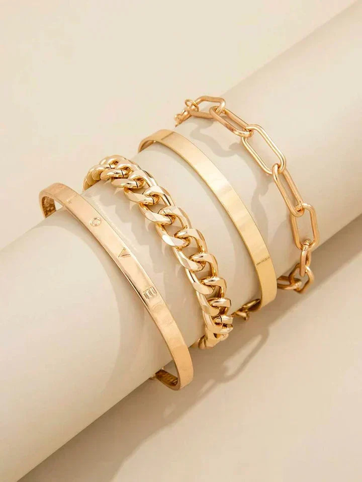 Conjunto de pulseiras douradas Elan™ da Rose & Oliver, com detalhes elegantes e acabamento brilhante, ideal para acessórios femininos.